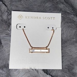 White and Rose gold Kendra Scott rectangle pendant!